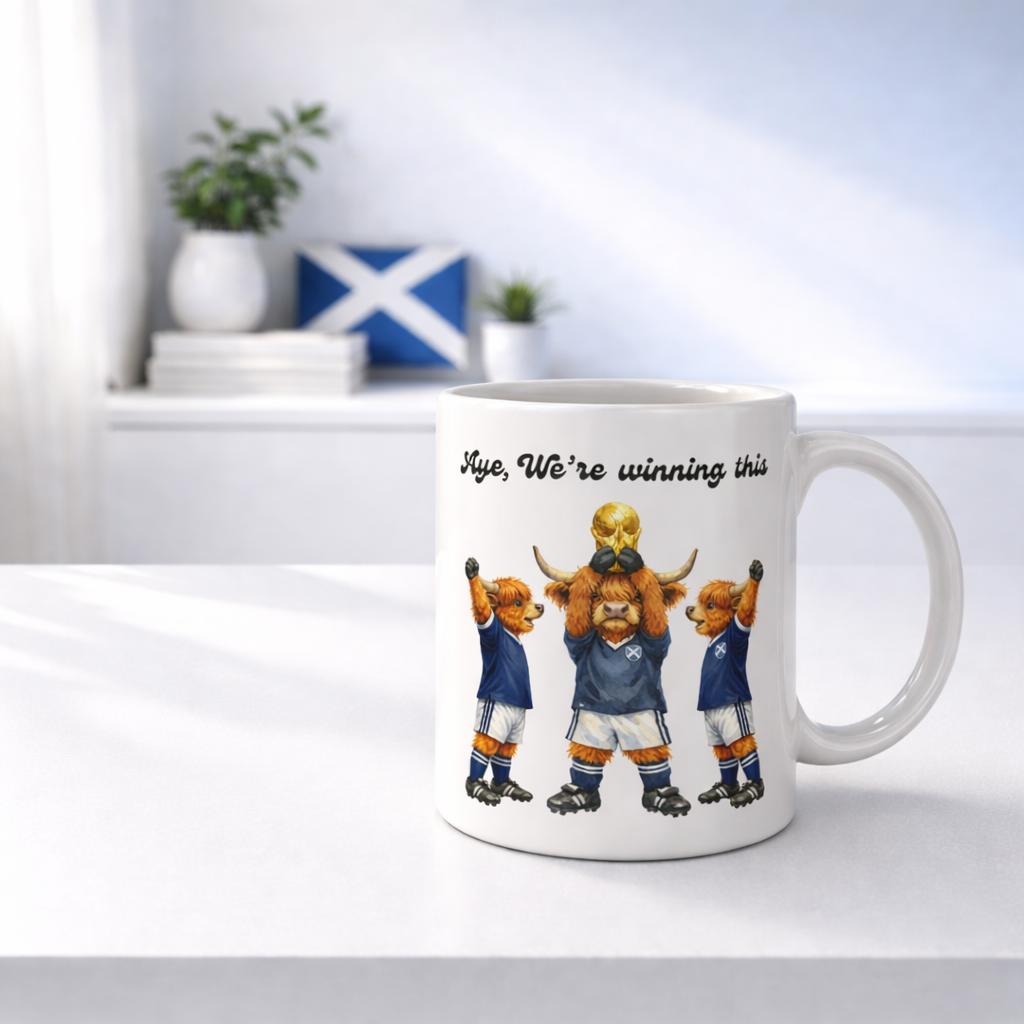 Scottish Highland Cow Football Mug – “Aye We’re Winning This” – Scotland Fan Gift