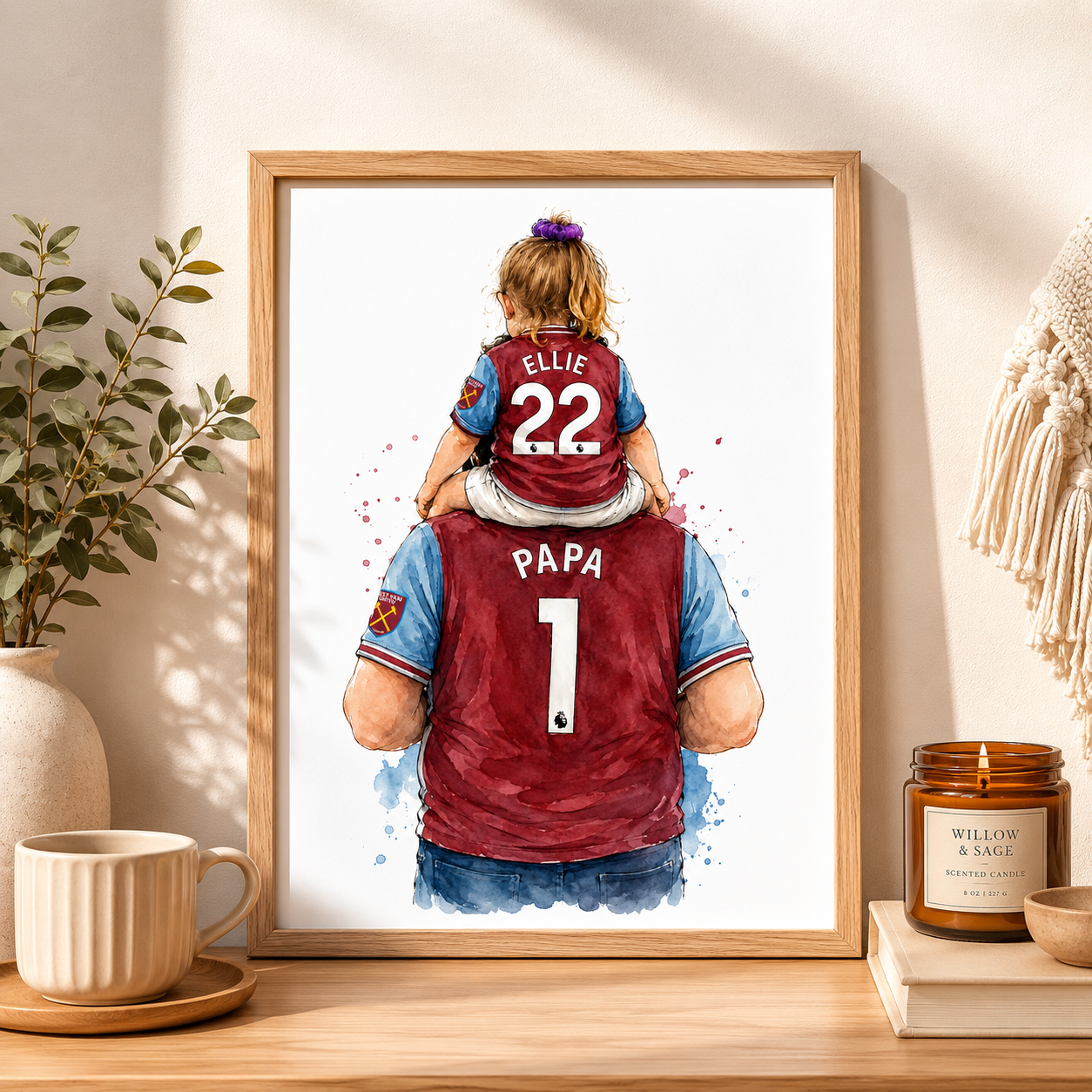 artwork of a father and daughter wearing matching jerseys on a wooden surface.