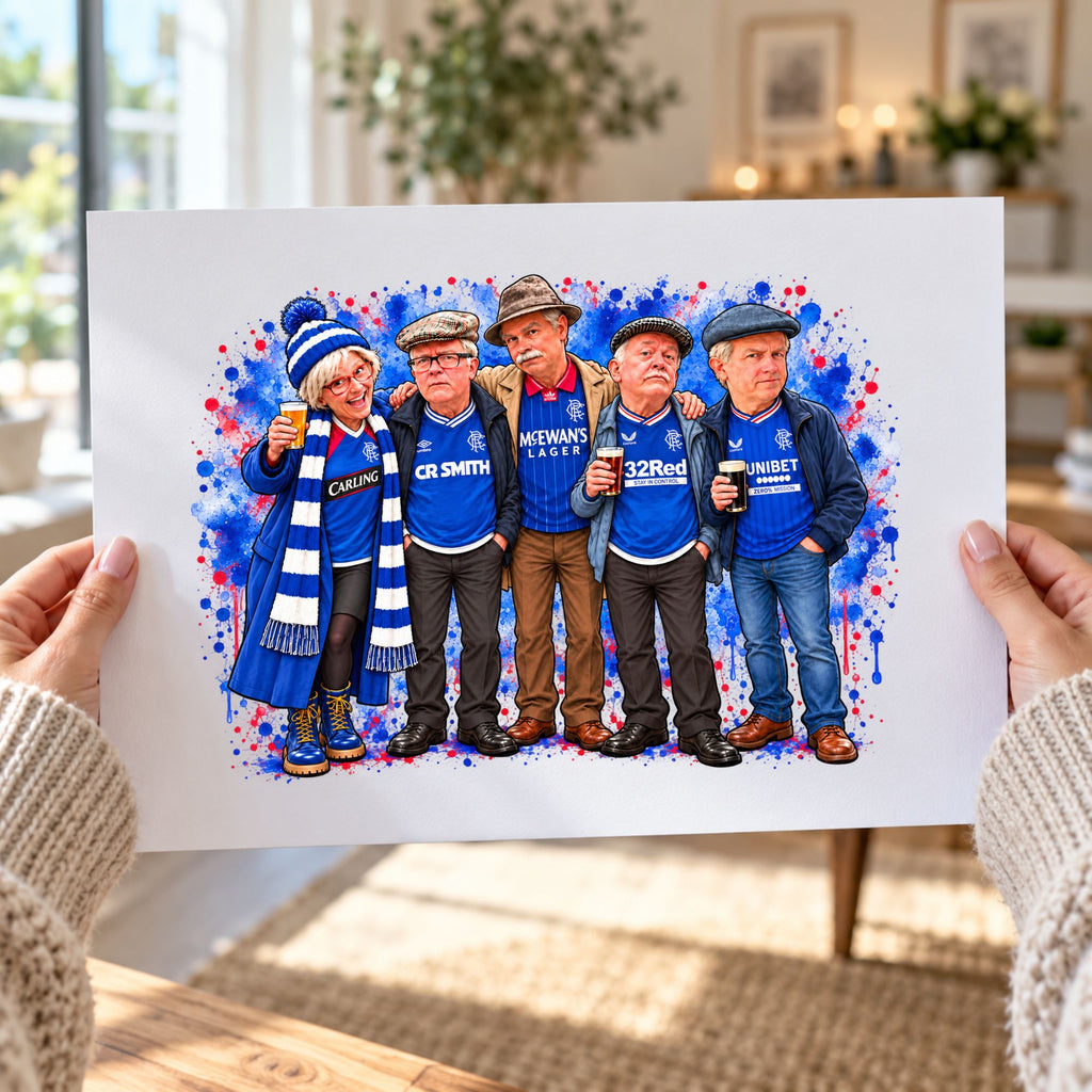 A person holds up a printed watercolor-style artwork showing five people in blue sports jerseys and winter clothing, with a splattered blue, red, and white background. The room in the background is softly blurred, and the person is wearing a cream knit sweater.