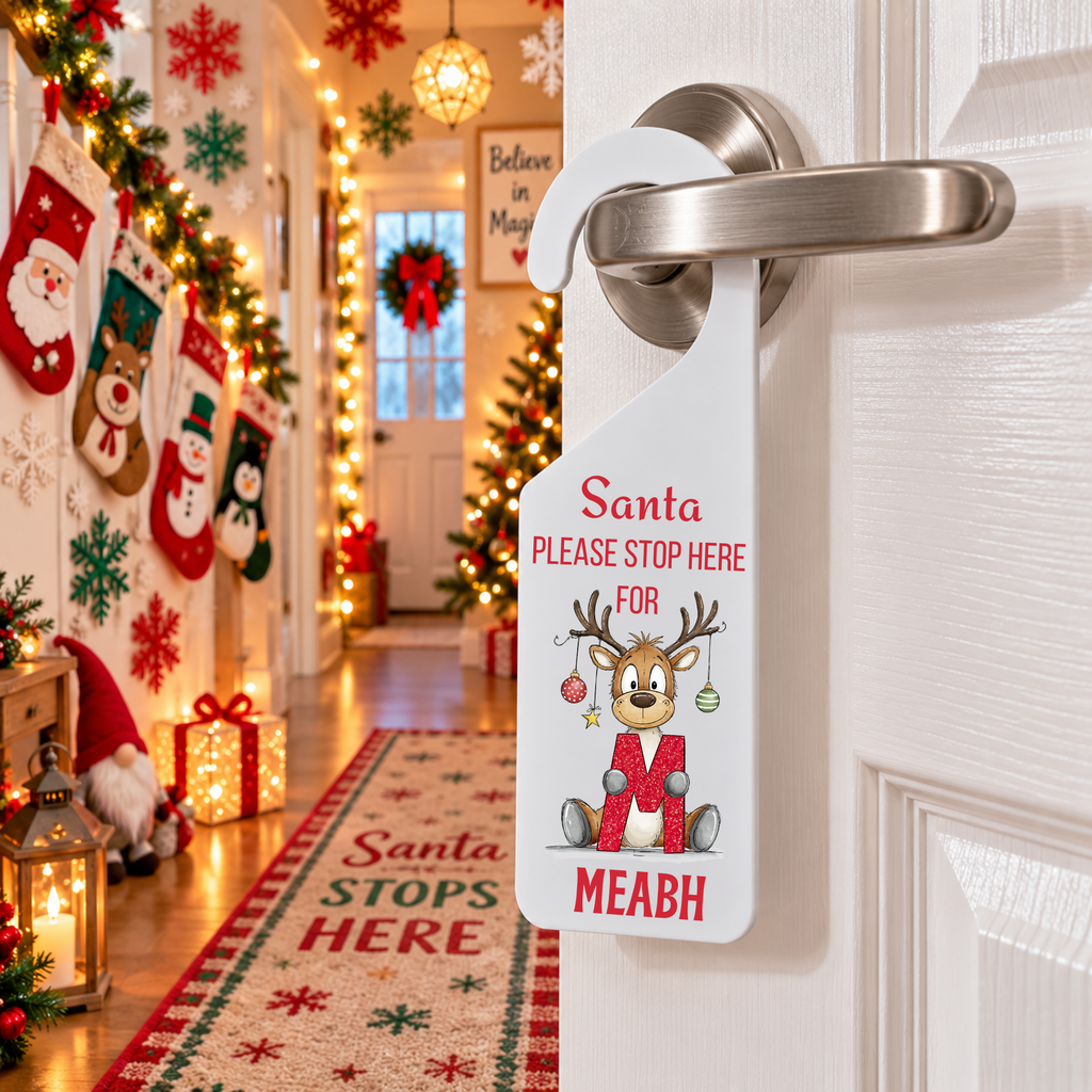Personalised reindeer alphabet Christmas door hanger with the name Meabh, hooks over door handle, matte white frost acrylic