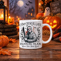Scary movie mug with hockey mask killer illustration and Camp Crystal Lake Running Team text, halloween mug on white background