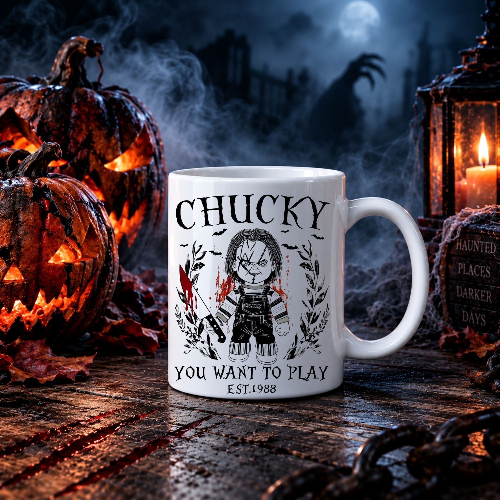 A white ceramic mug with a black and red Chucky graphic and text, displayed on a rustic wooden surface surrounded by Halloween props including jack-o'-lanterns, a lantern, and a spooky background.