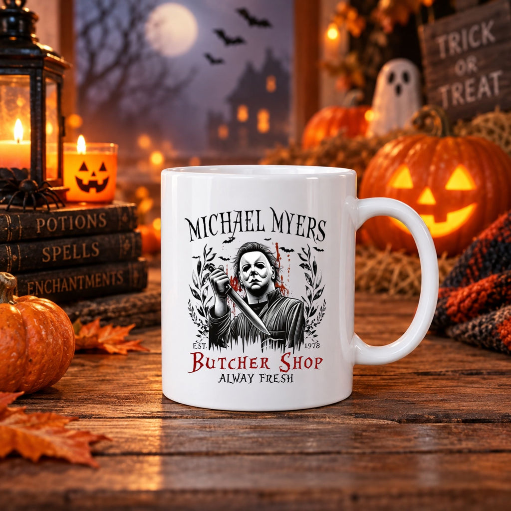 White 11oz Halloween scary movie mug with masked slasher holding knife design and "Always Shop Butcher Shop" text
