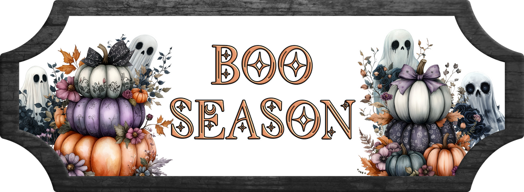 A decorative Halloween sign with the words “BOO SEASON” in large ornate letters, flanked by illustrated pumpkins, ghosts, and autumn foliage. The sign has a dark wood-look border and a white center panel.