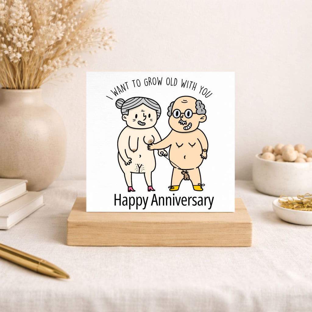 Funny anniversary card for husband or wife featuring cartoon naked elderly couple, one on a lead, with "I want to grow old with you" text