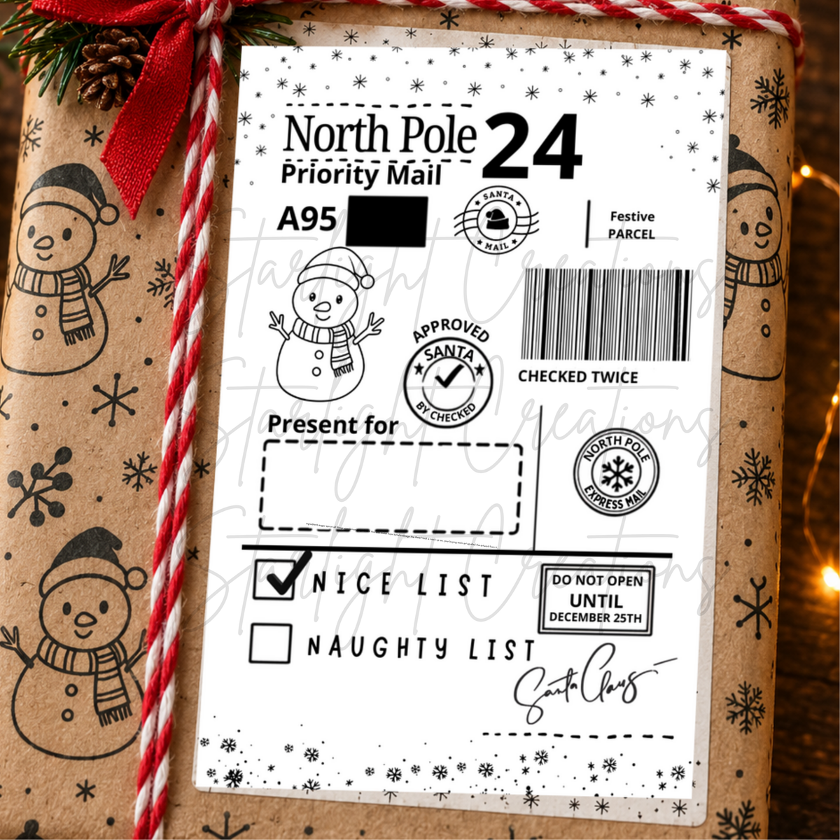 A North Pole 24 Priority Mail holiday stamp with festive black designs on a white label, wrapped around a brown kraft paper gift box with a red ribbon.