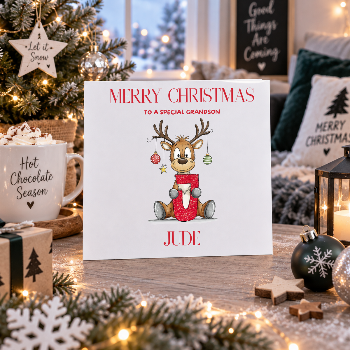 Personalised reindeer alphabet Christmas card for a grandson named Jude, blank inside, 6x6 inch card with white envelope