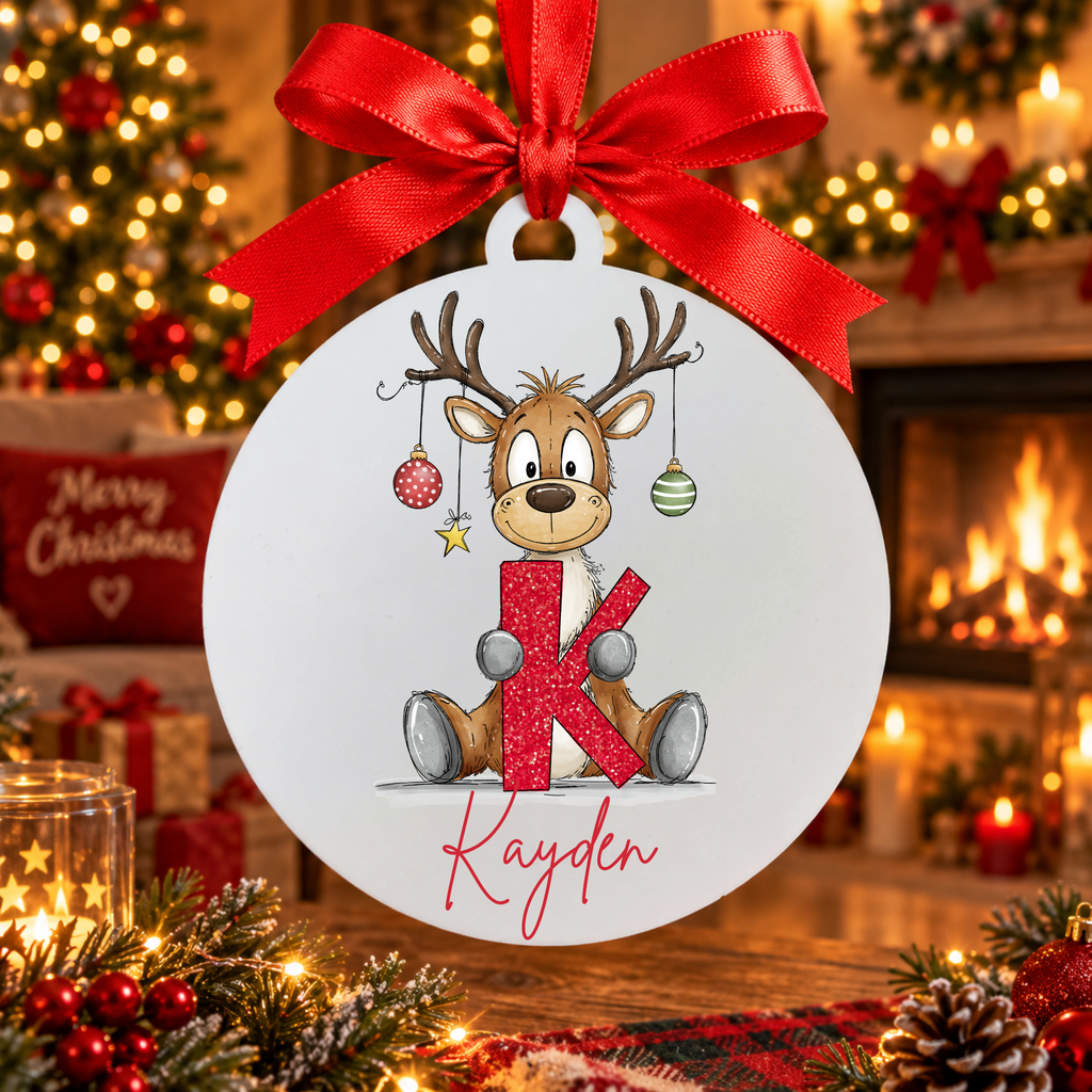 Personalised reindeer alphabet Christmas bauble with the name Kayden, red ribbon, matte white frost acrylic