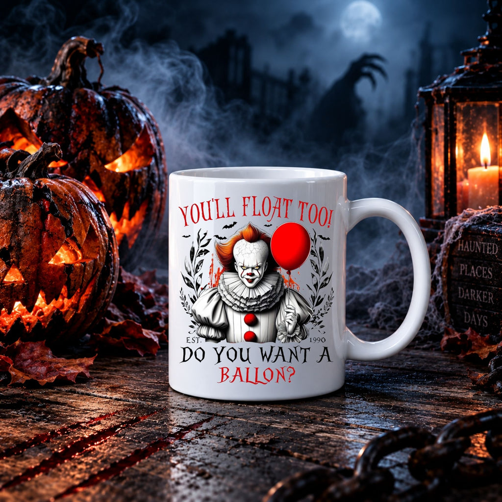 A white ceramic mug with a Pennywise Halloween graphic and the text 'YOU'LL FLOAT TOO! DO YOU WANT A BALLON?' is staged on a dark wooden surface surrounded by jack-o'-lanterns, a lantern, and a spooky night background.