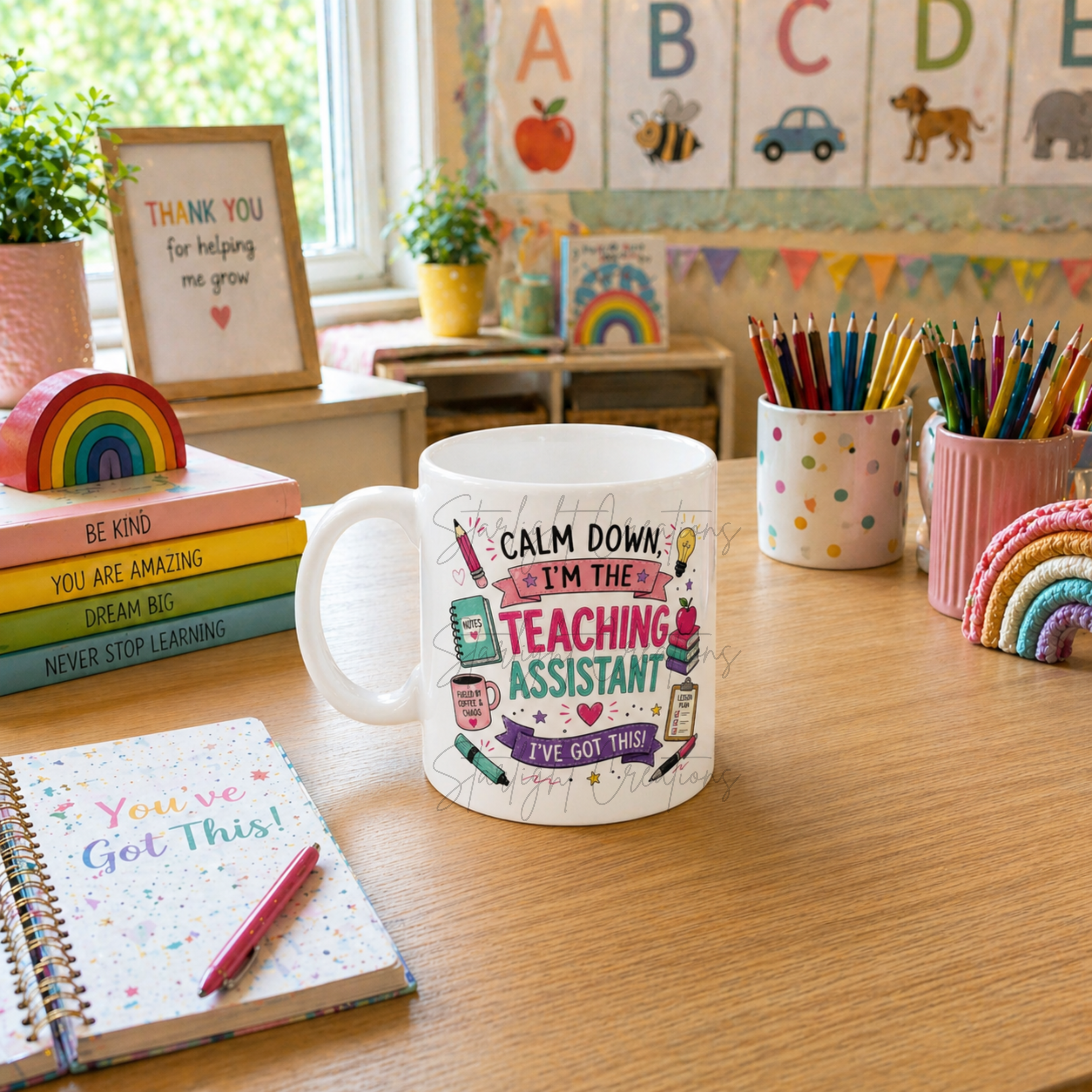 Ceramic mug gift for a TA shown with tea beside a pile of exercise books